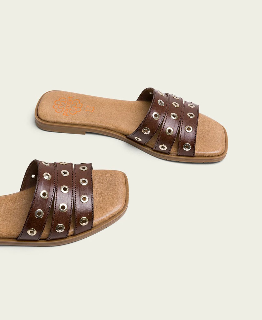 h2Sandalia destalonada plana Porronet Venus 3119 h2 pSumergete en la elegancia natural con la Sandalia destalonada Porronet Ven