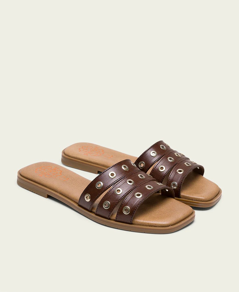 h2Sandalia destalonada plana Porronet Venus 3119 h2 pSumergete en la elegancia natural con la Sandalia destalonada Porronet Ven