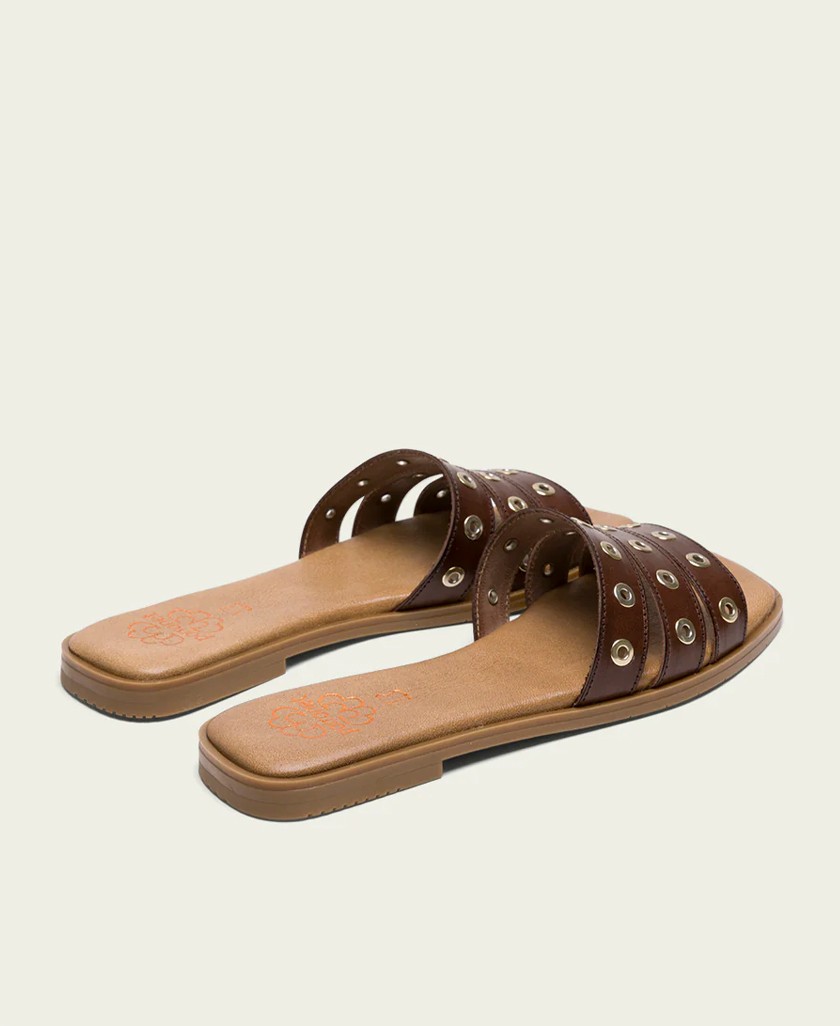 h2Sandalia destalonada plana Porronet Venus 3119 h2 pSumergete en la elegancia natural con la Sandalia destalonada Porronet Ven