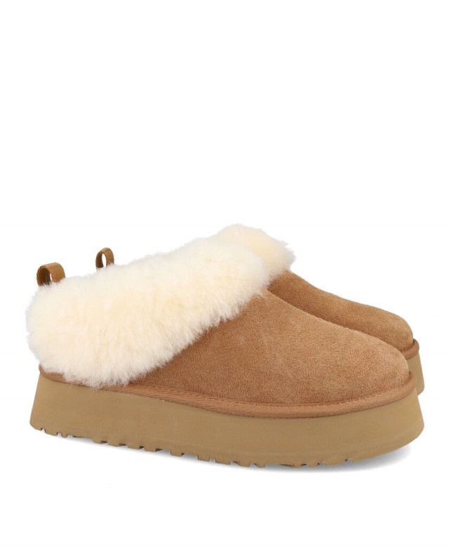h2Zapatillas abiertas UGG W Tazzelle h2 pLas UGG W Tazzelle en color camel son la combinacion perfecta entre un diseno casual y