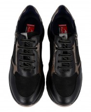 h2Zapatillas casual Fluchos Nexus F2308 h2 pLas zapatillas Fluchos Nexus F2308 en color negro con detalles dorados son la combi