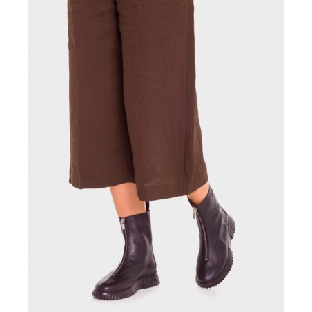 Sneakers de para mujer en color negro Caracteristicas cordones elasticos cuna 3 cm piso extra light exterior piel y textil e in