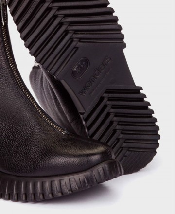 Sneakers de para mujer en color negro Caracteristicas cordones elasticos cuna 3 cm piso extra light exterior piel y textil e in