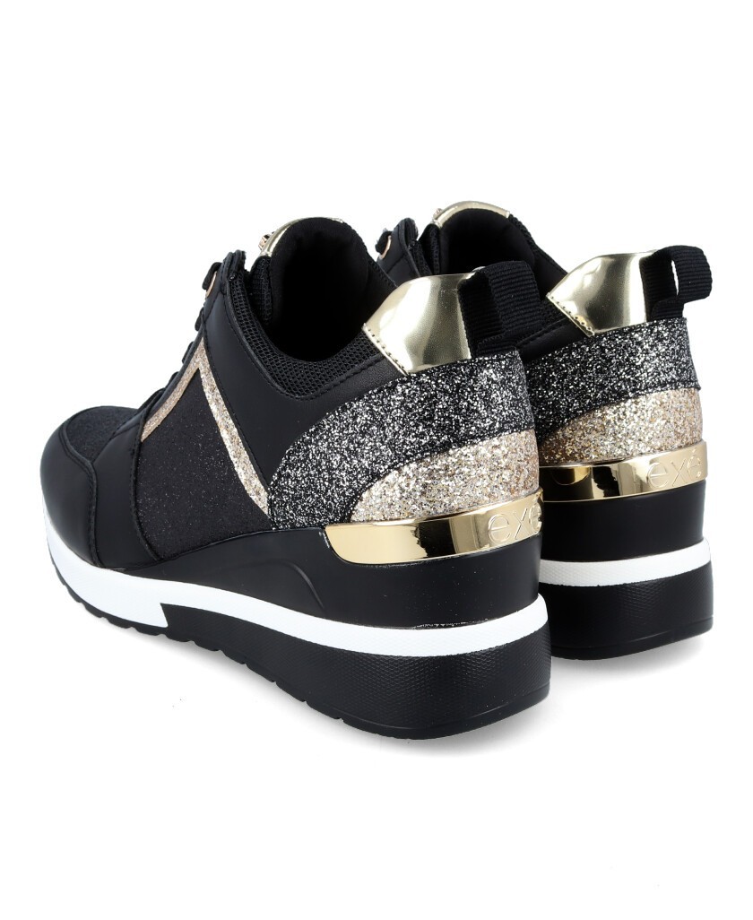 black wedge sneaker