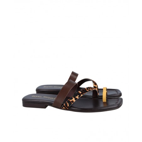 Bryan Zoe animal print flat sandals.